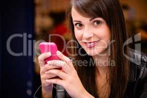 Portrait of beautiful woman using mobile phone