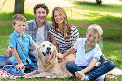 Family with dog in the park