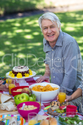 Senior man having picnic