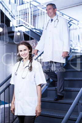 Doctors walking down stairs