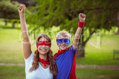 Mother and son pretending to be superhero