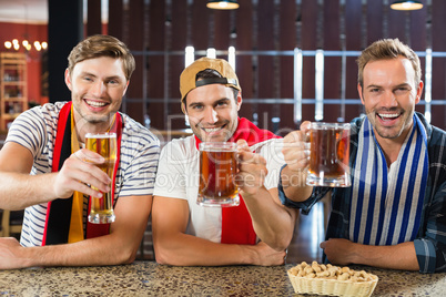 Men toasting with beers