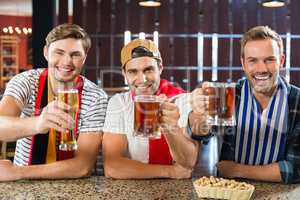 Men toasting with beers
