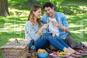 Couple having a picnic with wine