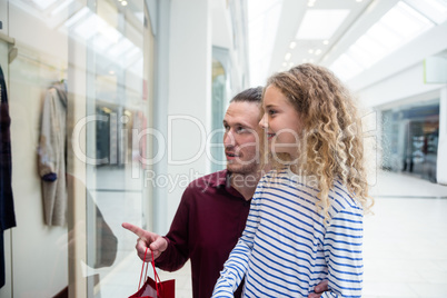 Happy father and daughter in shopping mall