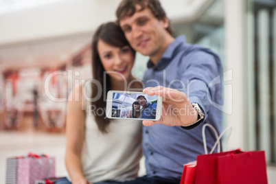 Happy couple taking a selfie