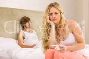 Worried woman waiting the pregnancy test result