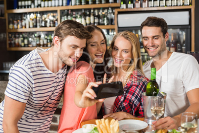 Friends taking a selfie Friends taking a selfie