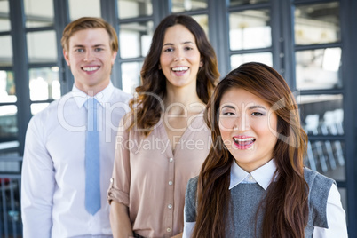Confident business team in office Confident business team in office