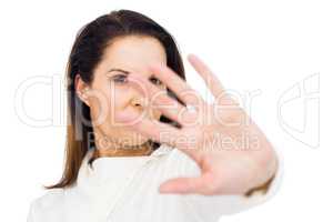 Unhappy woman hiding her face with hand