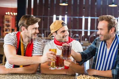 Men toasting with beers