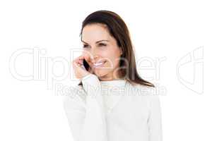 Smiling woman calling with her smartphone