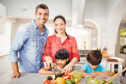 Happy woman preparing food with family