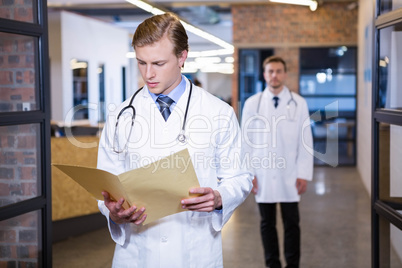 Doctor checking a medical report