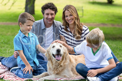 Family with dog in the park