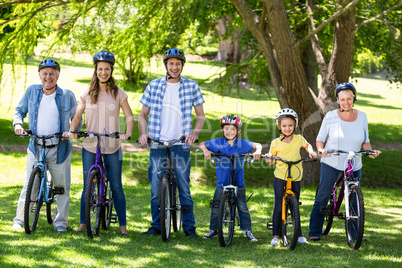 Smiling family with their bikes