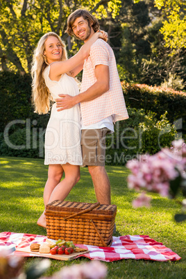 Happy couple having a picnic