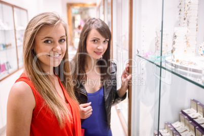 Portrait of two beautiful women in a store