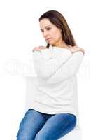 Desperate woman crossing arms on shoulders on white background