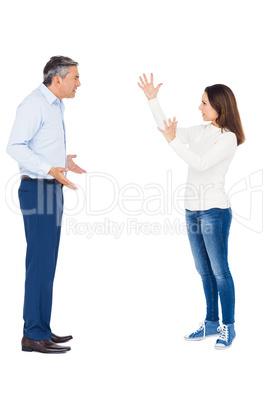 Couple arguing while standing