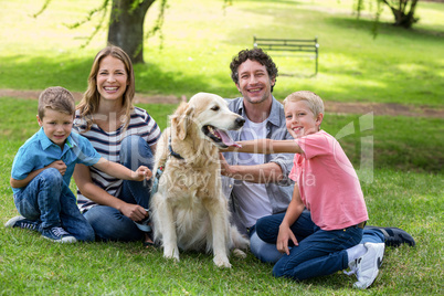 Family with dog in the park