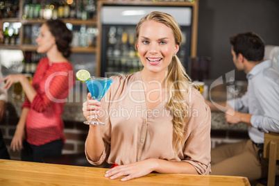 Attractive woman toasting