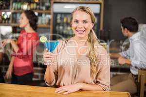 Attractive woman toasting