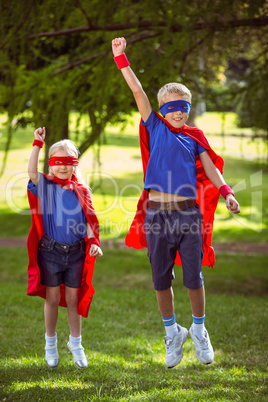 Brother and sister pretending to be superhero