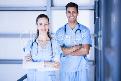 Doctors standing together with arms crossed