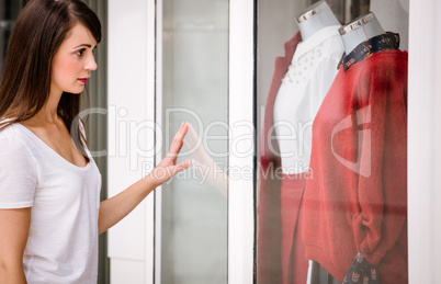 Beautiful woman window shopping