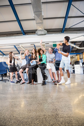 Group of businesspeople interacting during break time