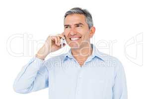 Smiling businessman phone calling