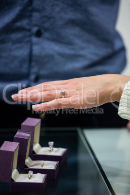 Woman trying a diamond ring