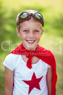 Little boy pretending to be superhero