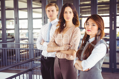 Confident business team in office Confident business team in office