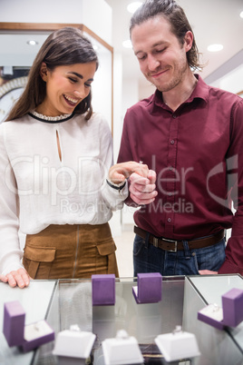 Couple selecting a finger ring