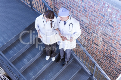 Doctors checking a medical report
