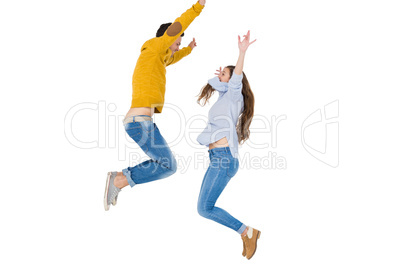 Happy couple jumping together