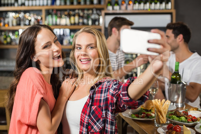Women taking a selfie