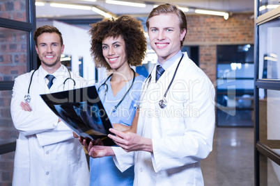 Group of doctors with xray report