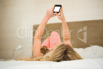 Pretty woman using smartphone