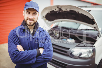Mechanic with arms crossed