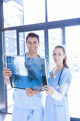 Medical team examining x-ray