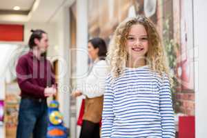 Portrait of happy girl in mall