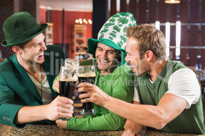 Men toasting beers