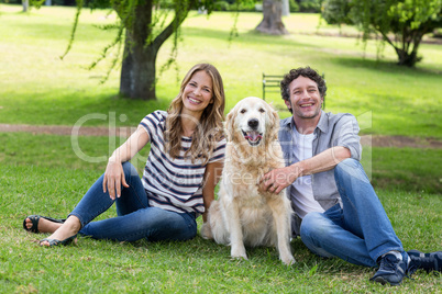 Couple with their dog in the park