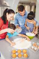 Children helping parents in preparing food