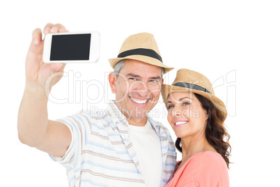 Cute couple taking selfie