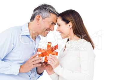 Cute couple holding box