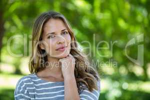 Portrait of a woman touching her chin